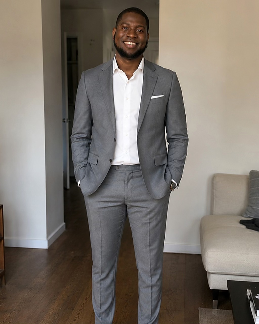 Jahmone Salmon in a grey suit
